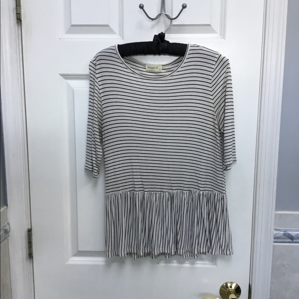 White and black peplum shirt
